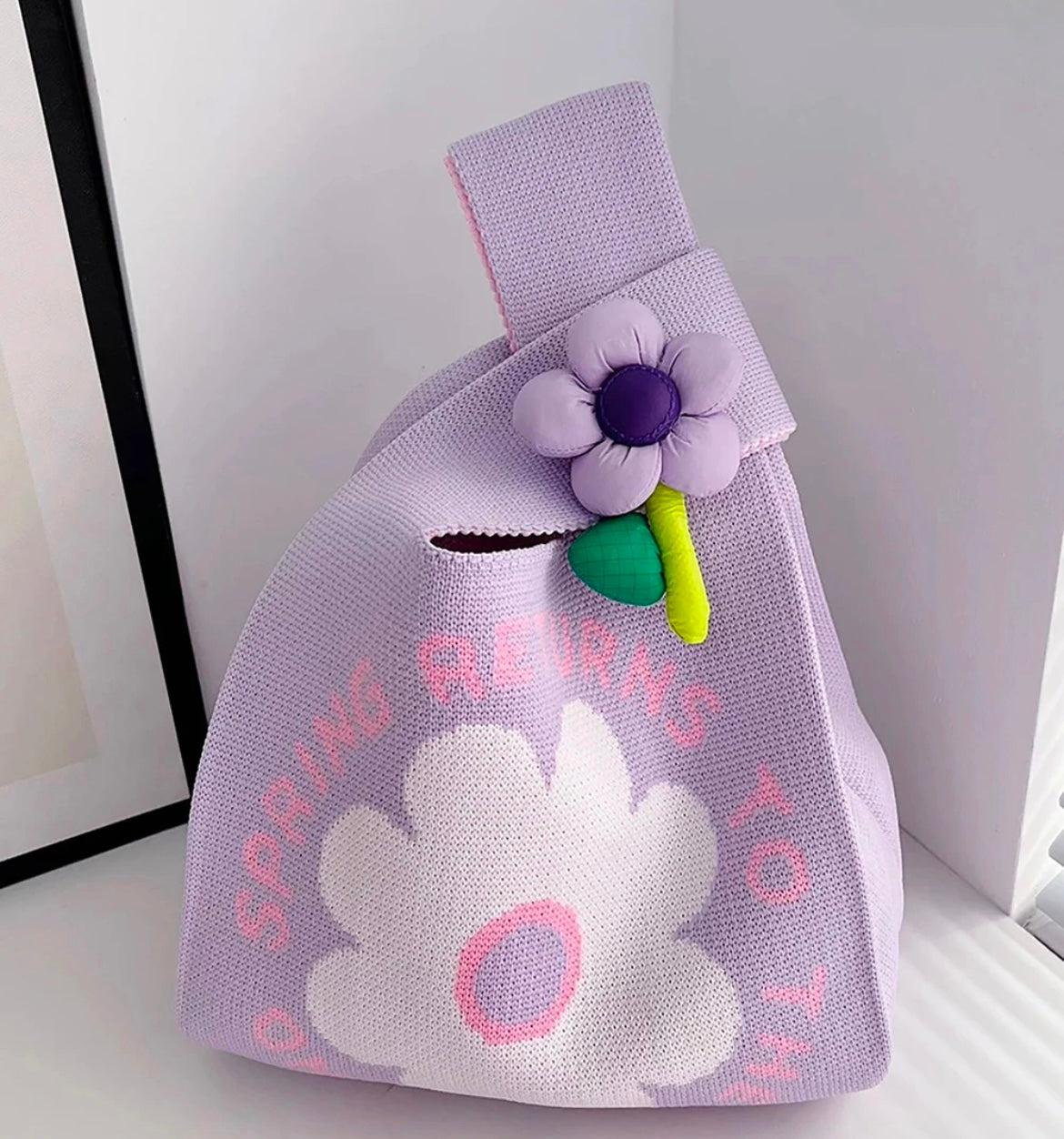 Spring bag with flower charm
